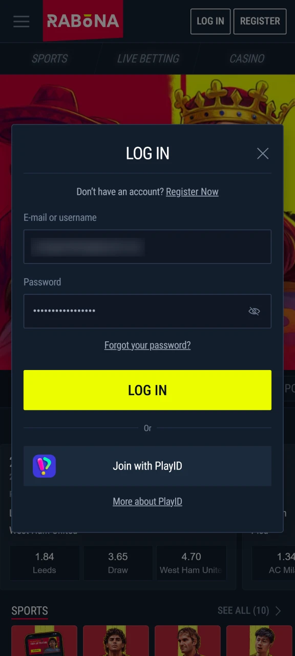 Accessing Rabona Aviator on iOS by entering account credentials.